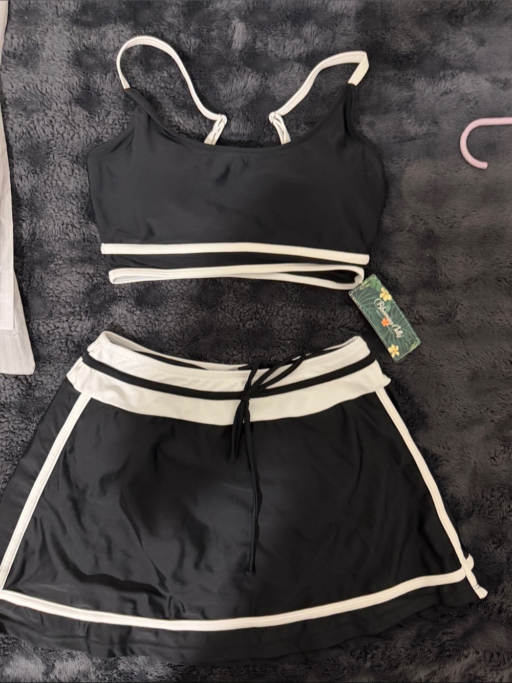 Blooming jelly two piece black and white bathing suit .